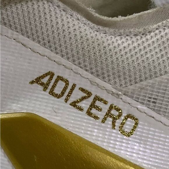 Adidas Adizero White and Gold Sports Cleats